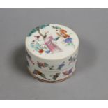 A 19th century Chinese famille rose box and cover, Liberty retail label,9.5 cms diameter.