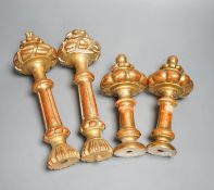 Two sets of four giltwood curtain tie/hold backs,Longest 31 cms.