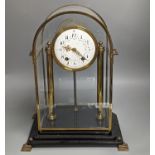 A large four glass clock, with decorative enamel dial,43.5 cms high.