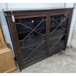 An Edwardian Chippendale revival astragal glazed mahogany bookcase, length 122cm, depth 35cm, height