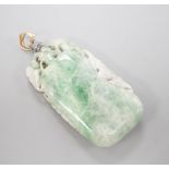 A Chinese mottled jadeite plaque 8cm