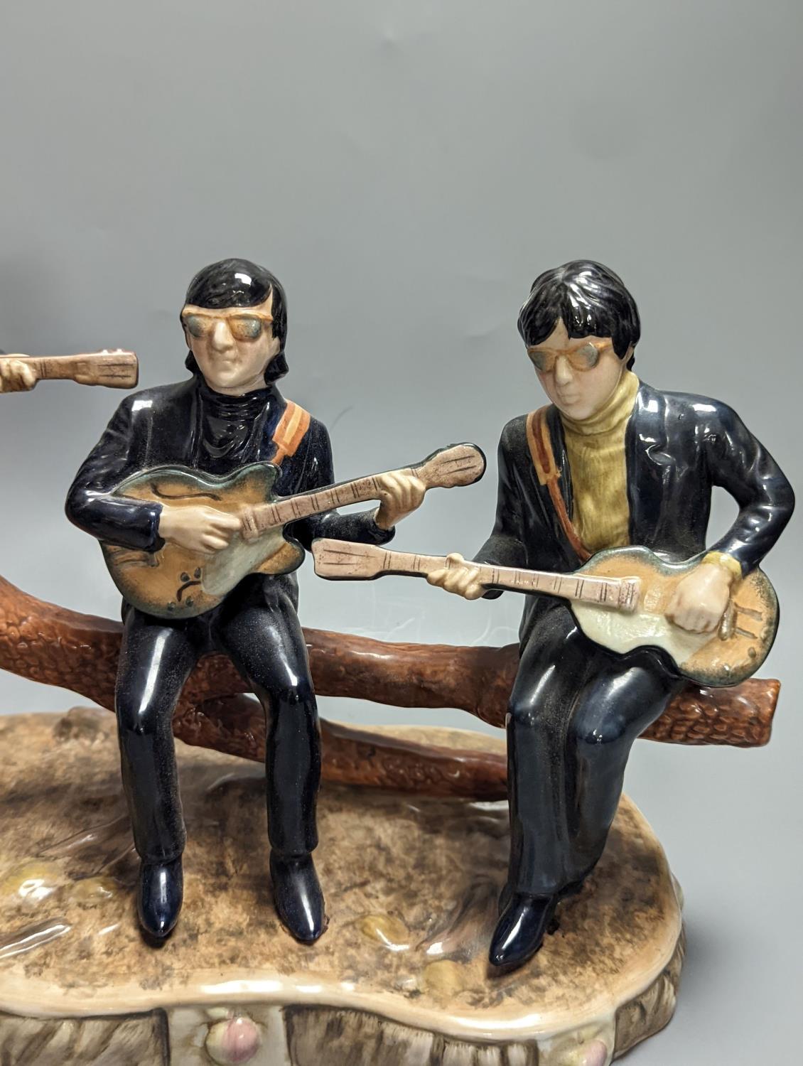 A large pottery figure group The Legends of Rock & Roll, The Beatles at Hyde Park 37cm long - Image 2 of 3