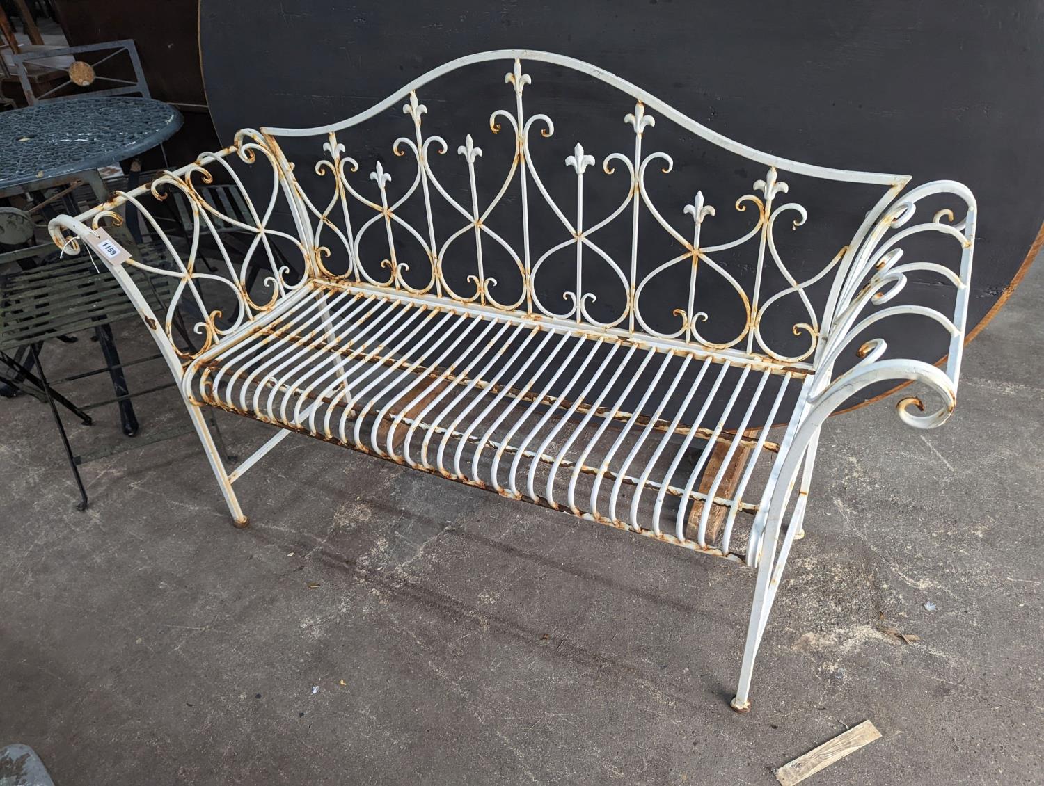 A painted metal folding garden bench, length 148cm, depth 50cm, height 93cm