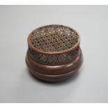 A Chinese bronze hand warmer, signd Zhang Mingqi 8cm diameter