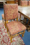A set of twelve 18th century style French walnut dining chairs on turned underframes with H
