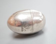 A George III silver egg shaped vinaigrette, by SM or WS, London, 1796, with engraved crest, 40mm.