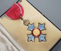 A cased CBE, unnamed