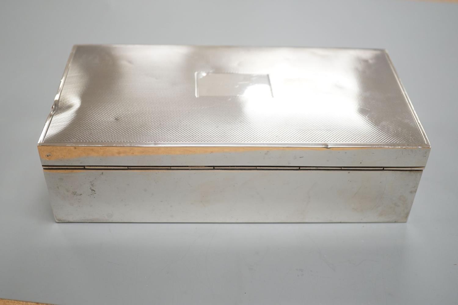 A late 1950's engine turned silver mounted rectangular cigarette box, with engraved inscription, - Image 3 of 6