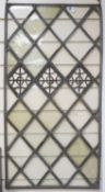 An antique lead and stained glass panel, possibly Elizabethan. 81x42cm
