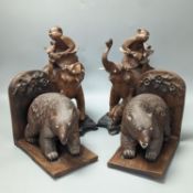 A pair of Chinese wood carvings figures on elephants, a pair of Chinese bear bookends,Chines figures