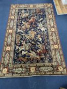 A Kashan style blue ground pictorial rug, 224 x 144cm