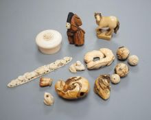 A group of 19th/early 20th century ivory ojime beads and netsuke (14)