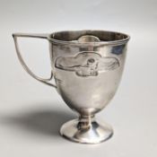 An Edwardian Art Nouveau silver pedestal christening mug, by William Hutton & Sons, London, 1904,