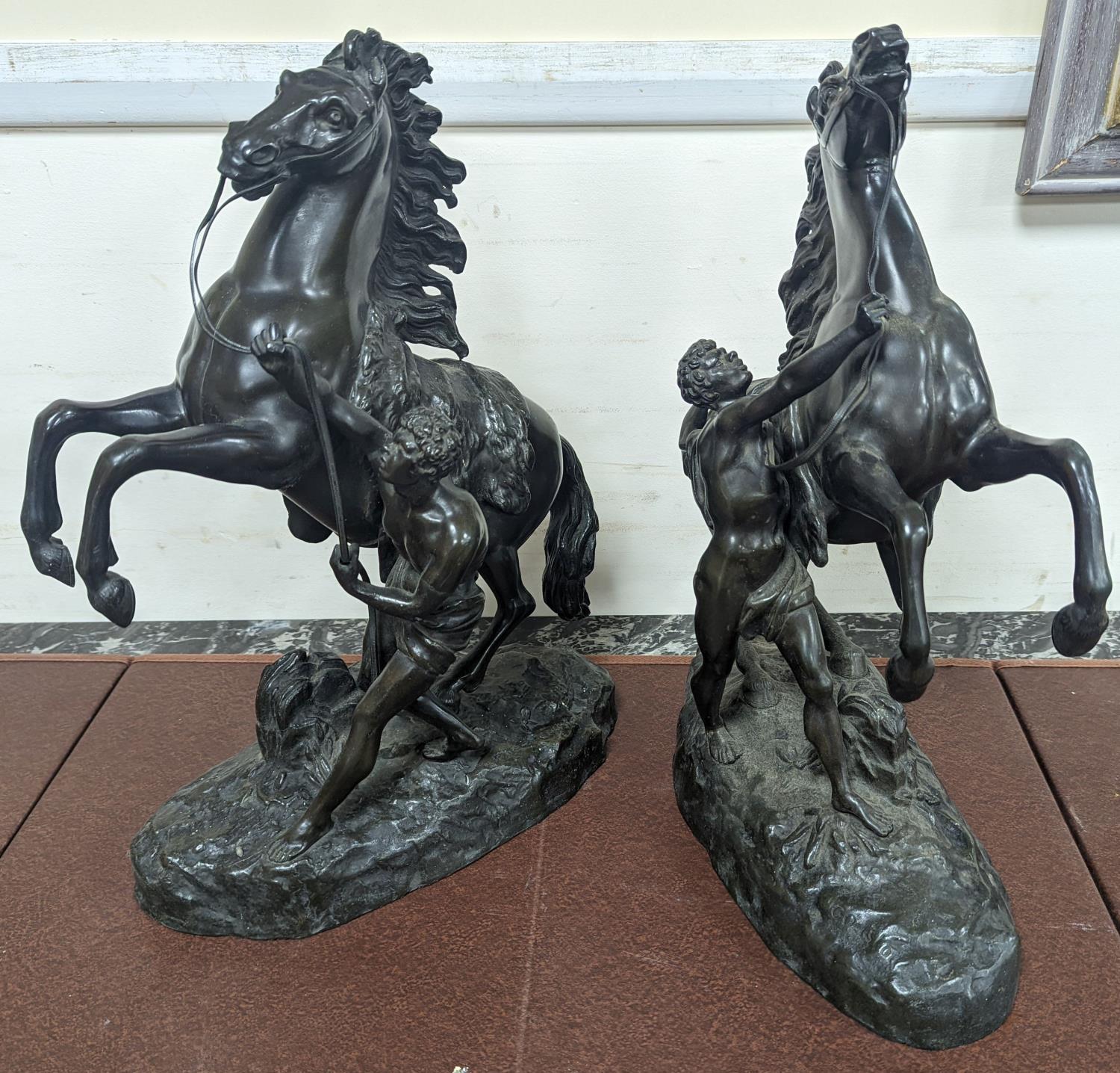 After Coustou, a pair of bronze Marly horses 41cm