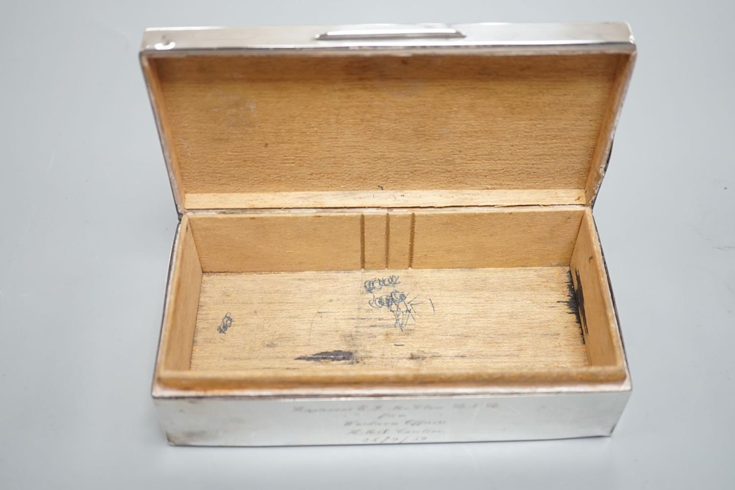 A late 1950's engine turned silver mounted rectangular cigarette box, with engraved inscription, - Image 4 of 6