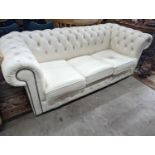 A Victorian style buttoned white leather Chesterfield settee, length 190cm, depth 86cm, height 72cm