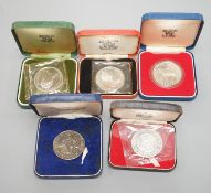 A collection of QEII Brilliant UNC and proof coins including cased set of eight silver jubilee