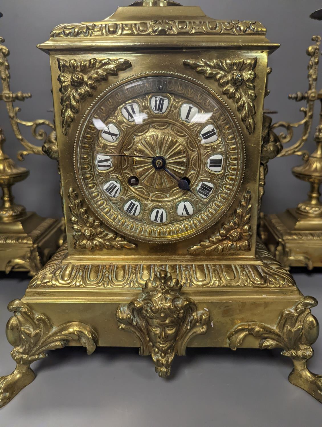 A 19th century French ornate brass clock garniture including a pair of 3 branch candelabraClock 42 - Image 3 of 4