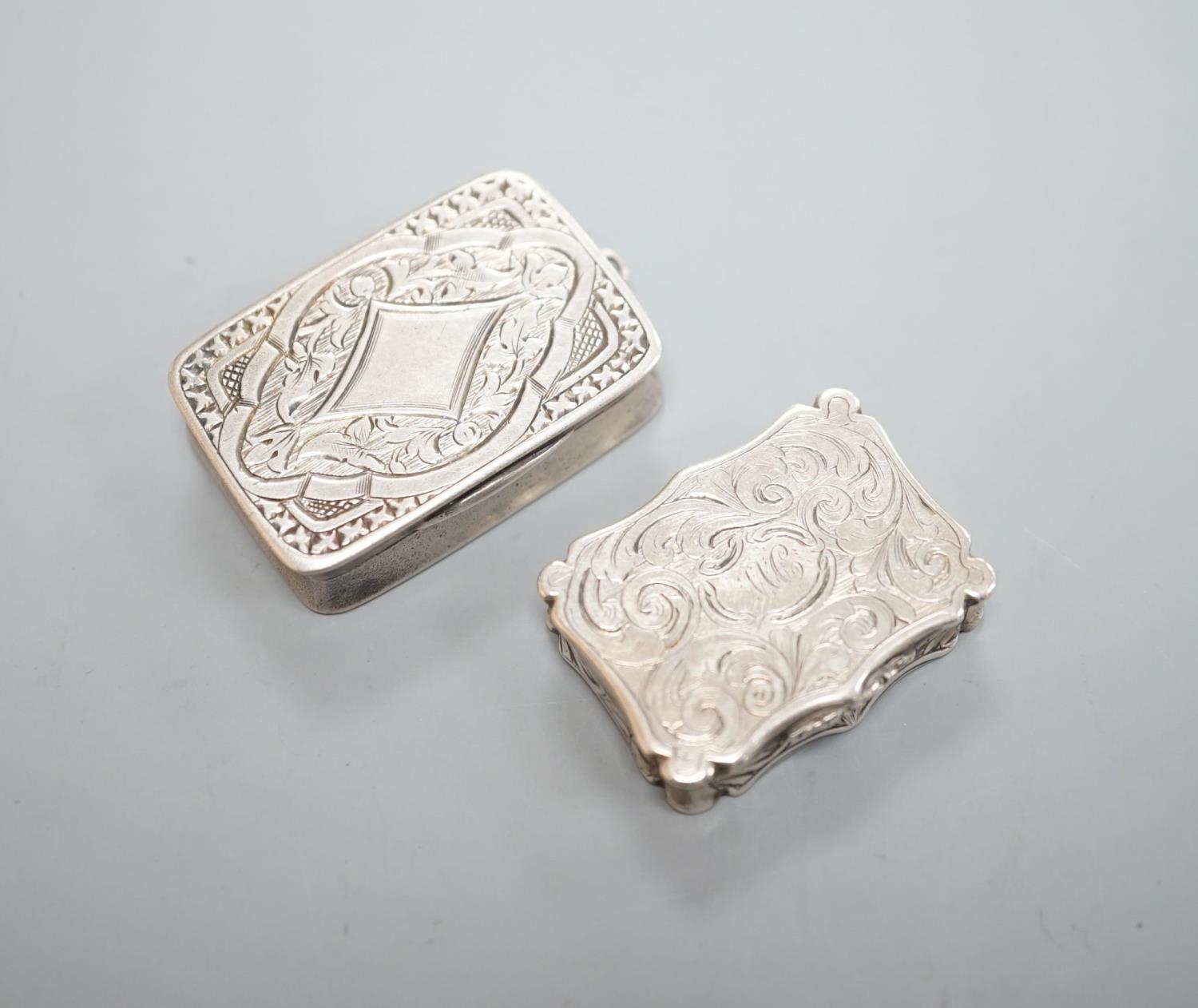 An early Victorian engraved silver shaped rectangular vinaigrette, by Nathaniel Mills, Birmingham,