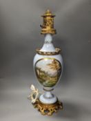 A French 19th century porcelain and ormolu oil lamp (later converted to an eclectic lamp),54 cms