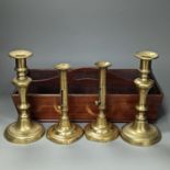 A pair of brass push-ejector candlesticks, a pair of Victorian brass candlesticks and a Victorian