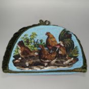 A 19th century beadwork tea cosy, with chicken design to both sides