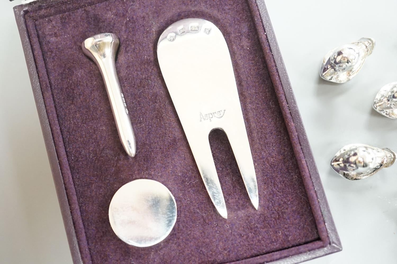 A modern Asprey cased silver golfer's companion set, comprising a tee, marker and pitch mark - Image 2 of 7