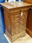 A 19th century French elm bedside cabinet with dummy drawer front, width 47cm, depth 36cm, height