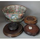 A Chinese famille rose bowl, plate and four stands,bowl 31 cms diameter.