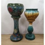 A Staffordshire pottery jardiniere and stand (the jardiniere with a small crack) and another,