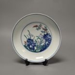 A Chinese doucai saucer dish, Yongzheng mark but later 20cm diameter