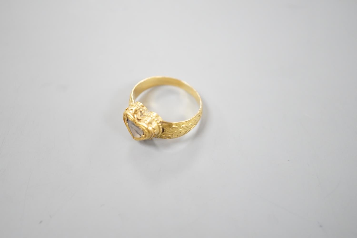 An Indian yellow metal and heart shaped diamond set ring, with engraved shank, size O, gross - Image 5 of 10