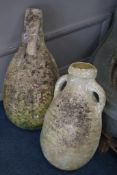 Two Roman style earthenware and plaster garden ewers, larger height 60cm