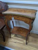 A Louis XV style Kingwood and marquetry inlaid gilt metal mounted two tier side table, width 58cm,