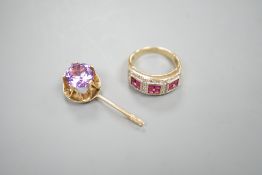 A modern 9ct gold, ruby and diamond cluster ring and a modern yellow metal and gem set pendant,