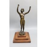 An Art Deco style bronze model of a nude female. 36cm