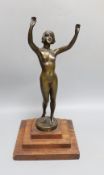 An Art Deco style bronze model of a nude female. 36cm