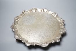 A late George II silver salver, with later engraved decoration, Ebenezer Coker, London, 1758,