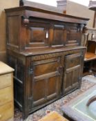 An 18th century oak court cupboard, length 147cm, depth 58cm, height 152cm