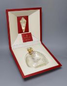 An empty bottle of Louis XIII Remy Martin Grande Champagne Cognac, carafe number DK3774 with