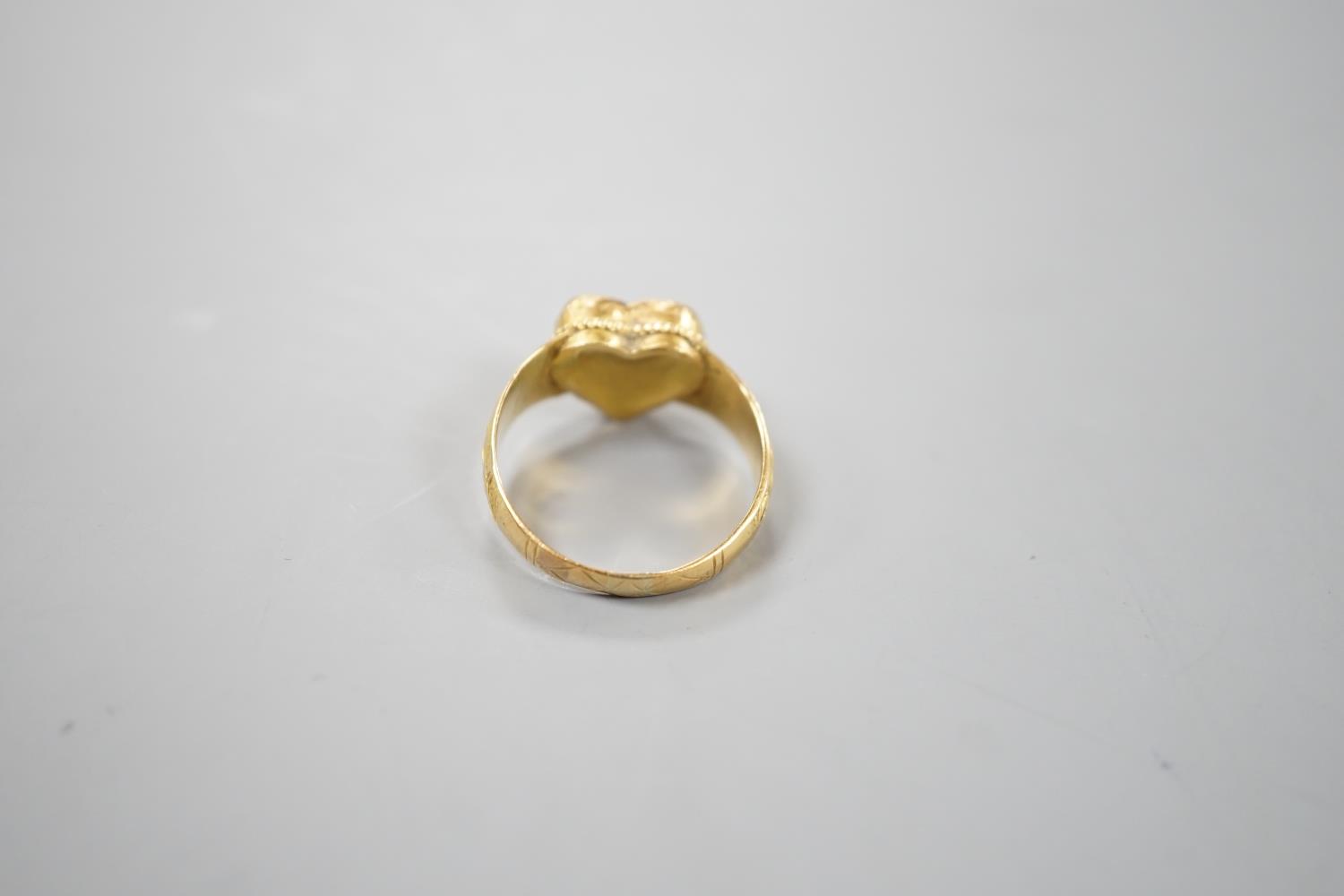 An Indian yellow metal and heart shaped diamond set ring, with engraved shank, size O, gross - Image 6 of 10
