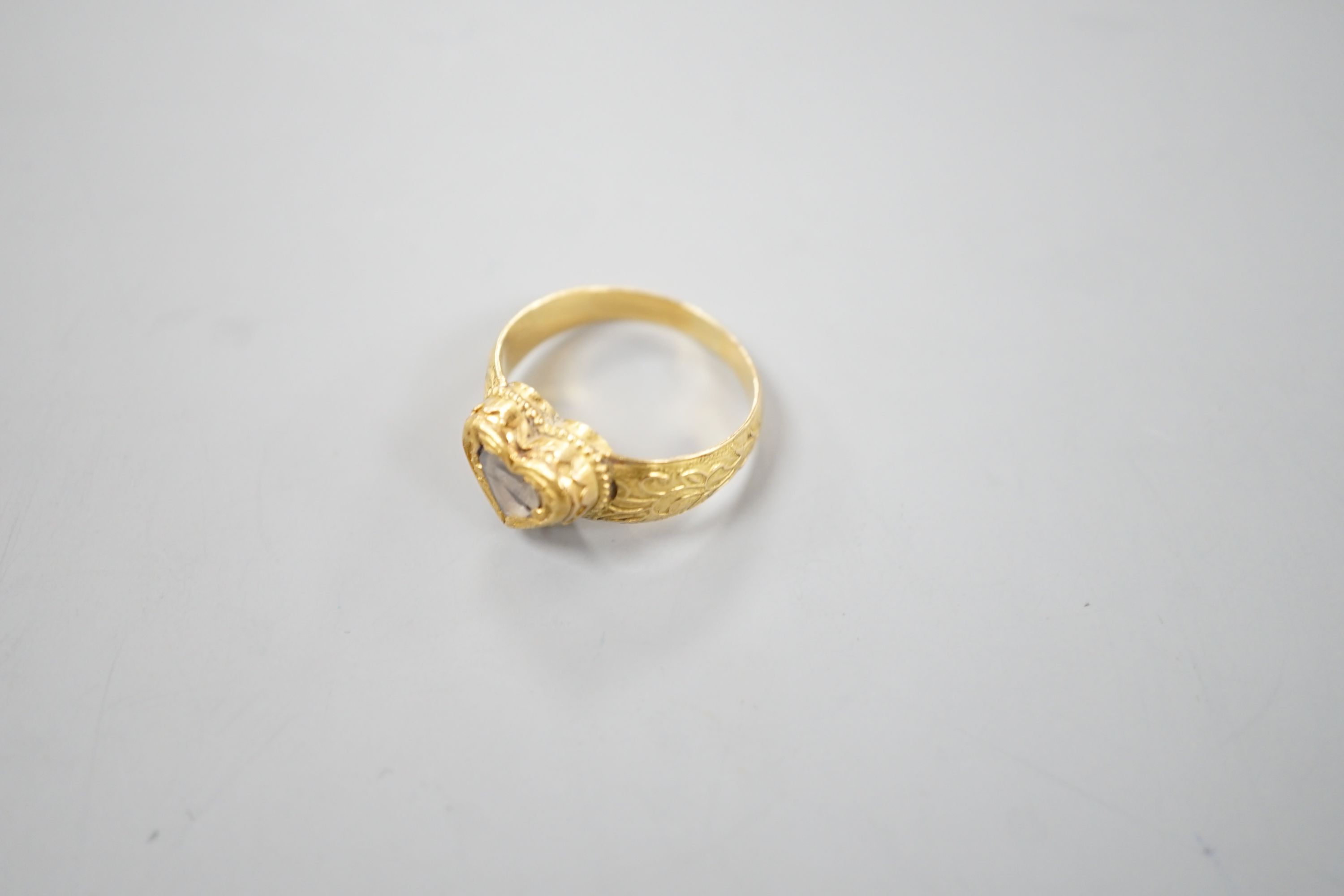 An Indian yellow metal and heart shaped diamond set ring, with engraved shank, size O, gross - Image 9 of 10