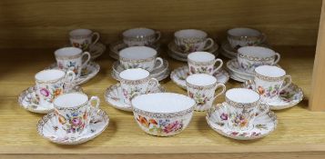 A quantity of Nymphenburg and Dresden porcelain cups and saucers