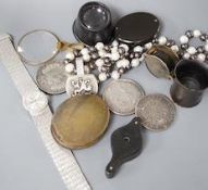 A collection of coins, magnifying loupes, cultured pearl necklace, etc.