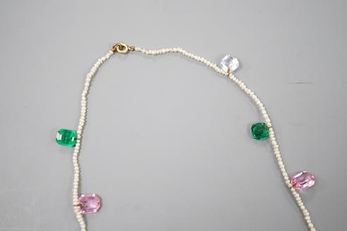 A multi coloured paste and opal doublet set baroque seed pearl necklace, 42cm. - Image 5 of 10