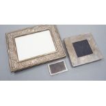 Three modern silver mounted photograph frames, largest 17.9cm.