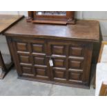 A Spanish panelled walnut two door cabinet, width 107cm, depth 54cm, height 70cm