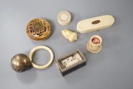 A collection of ivory objects, to include a manju netsuke, a needle box, miniature dominos, etc.,