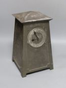 An Art Nouveau Liberty style hammered pewter mantel timepiece, Lenzkirch movement with key, 28 cms