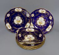 A Late 19th/early 20th century Coalport set of six plates and a square dish, which is signed F
